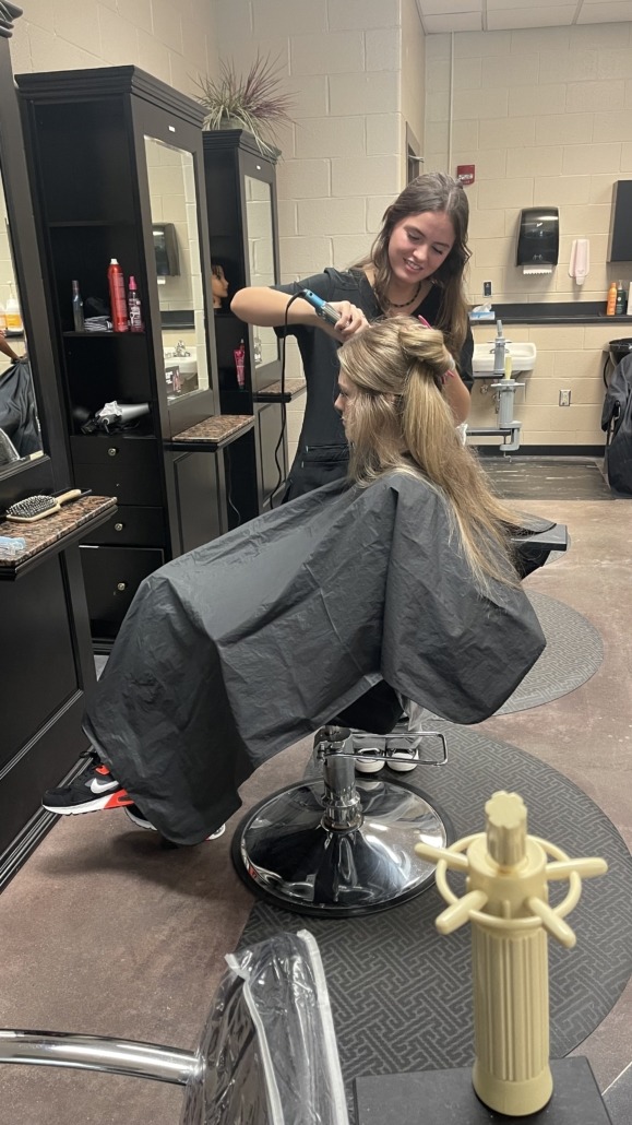 girl getting hair cut